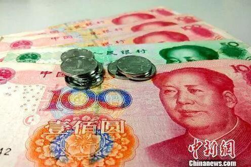 资料图：人民币。中新网记者 李金磊 摄